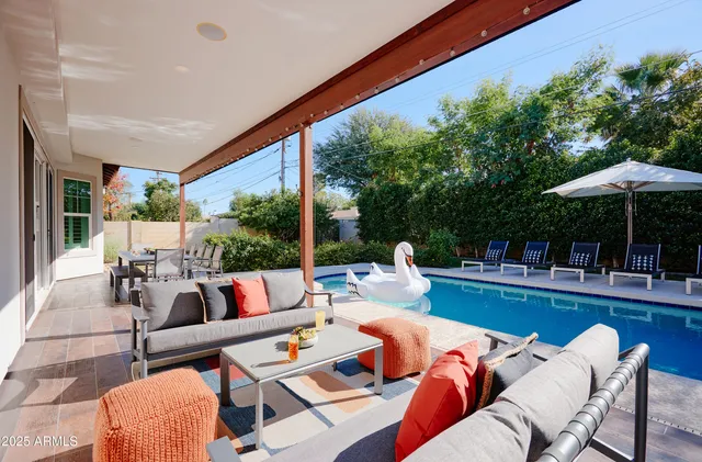 a outdoor living space with furniture and garden view
