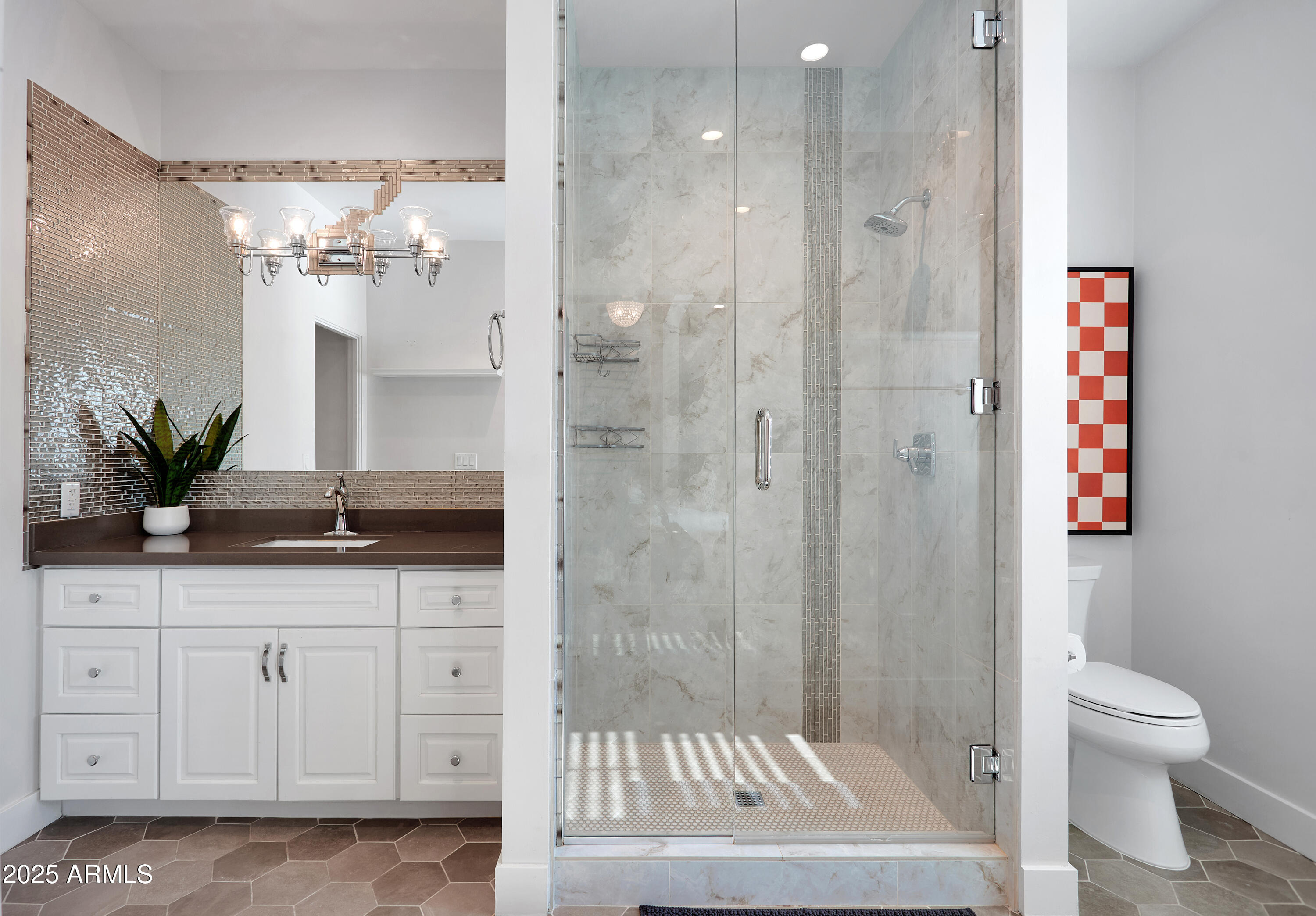 3229 East Campbell Avenue Phoenix, AZ 85018 - Photo 24 of 44 a bathroom with a granite countertop sink a toilet and a shower