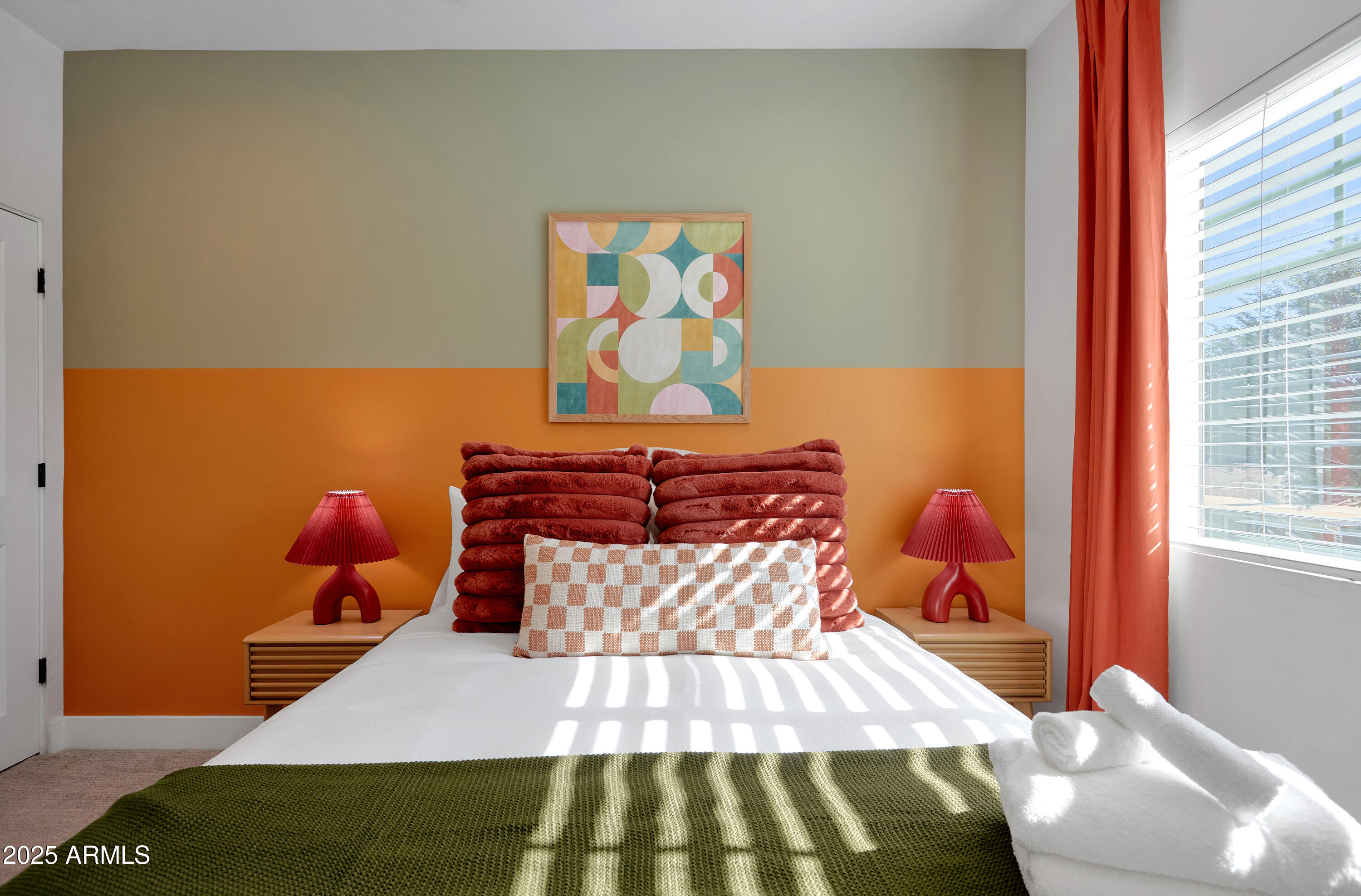 3229 East Campbell Avenue Phoenix, AZ 85018 - Photo 27 of 44 a bedroom with a bed and window