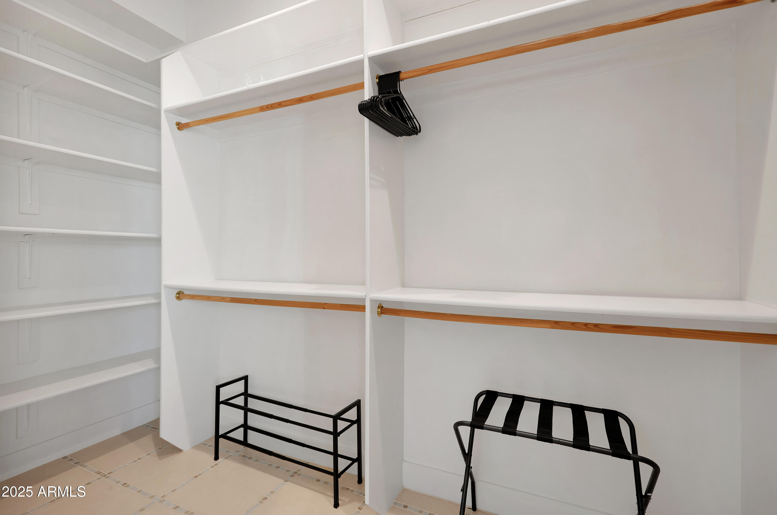 3229 East Campbell Avenue Phoenix, AZ 85018 - Photo 39 of 44 a view of staircase with white walls and a window