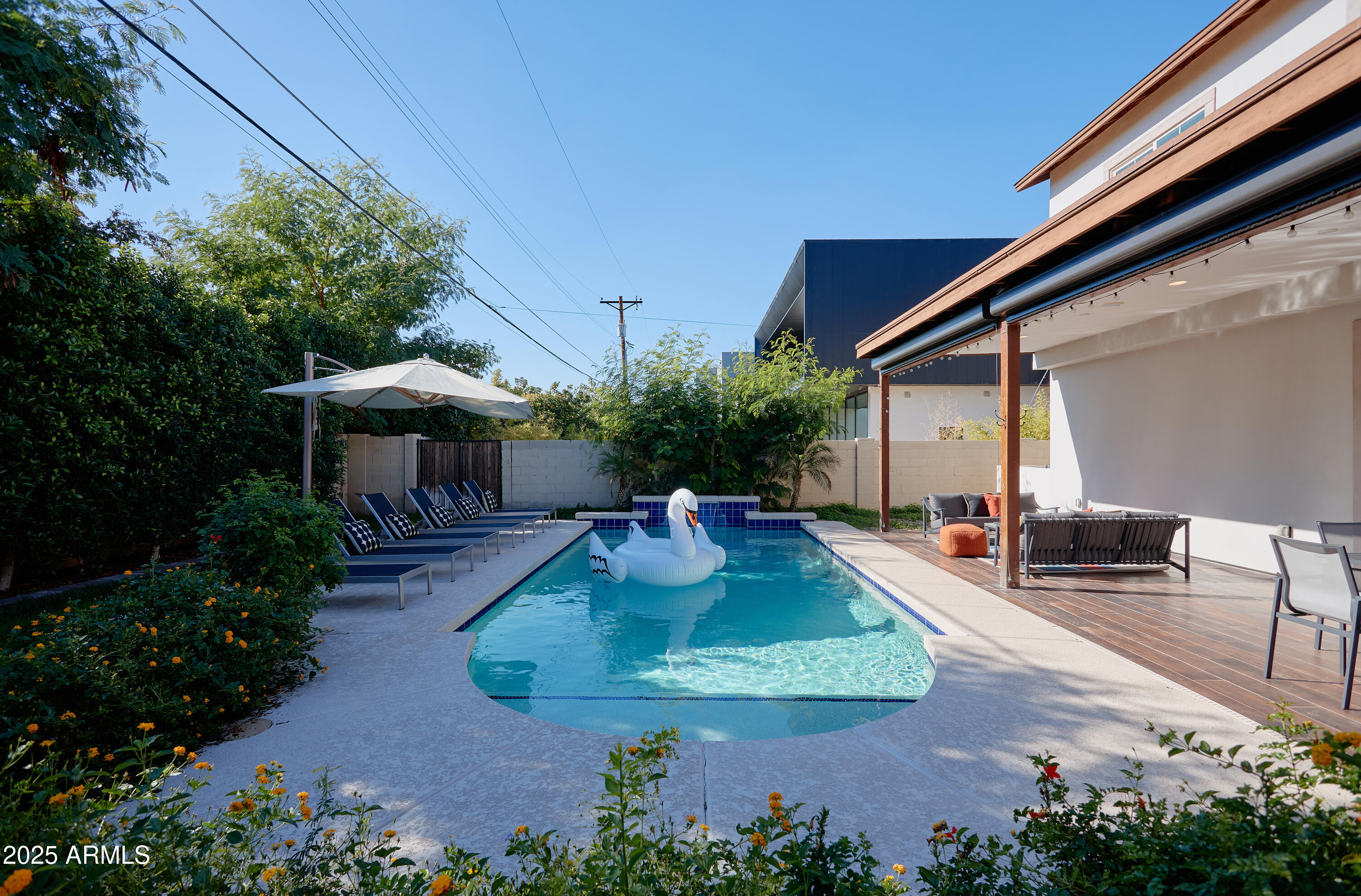 3229 East Campbell Avenue Phoenix, AZ 85018 - Photo 41 of 44 a view of a house with backyard and sitting area