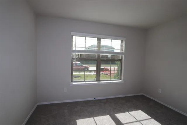 a view living room with stainless steel appliances wooden floor and chair