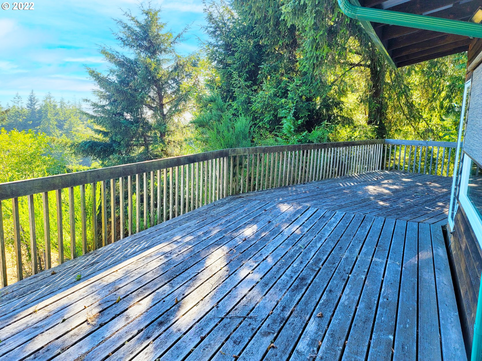5529 Herman Cape Road Florence, OR 97439 - Photo 8 of 17 a view of deck with wooden floor and outdoor space