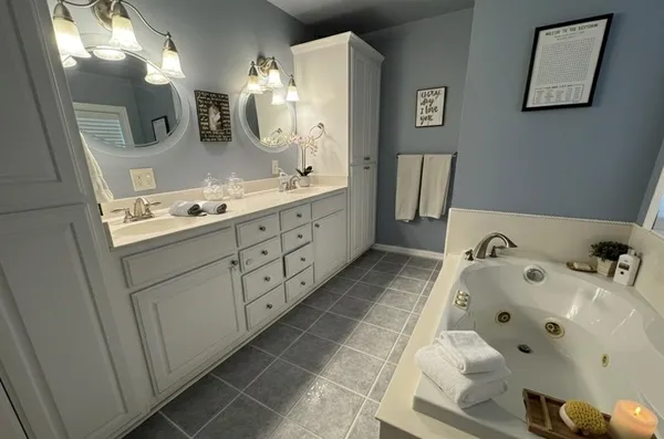 a view of a dining area with furniture and chandelier