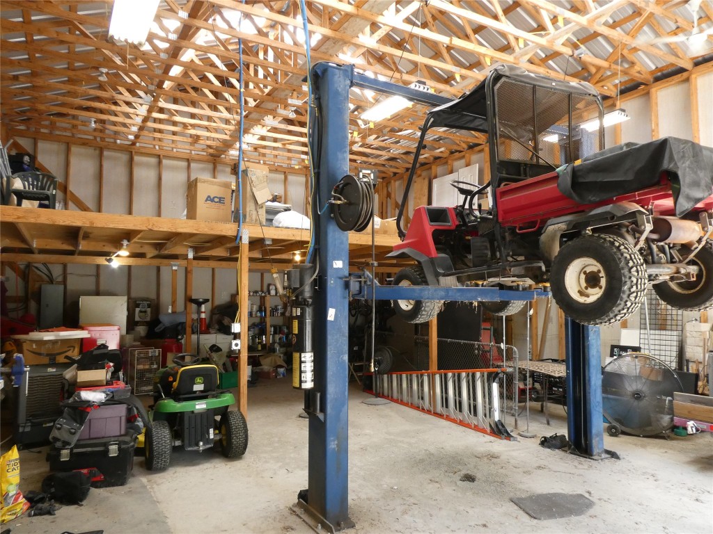 210 Amandas Way Leander, TX 78641 - Photo 38 of 38 Garage with lift
