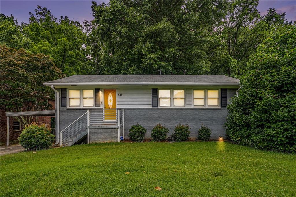 232 Whitworth Drive Southwest Atlanta, GA 30331 - Photo 1 of 1 a backyard of a house with lots of green space