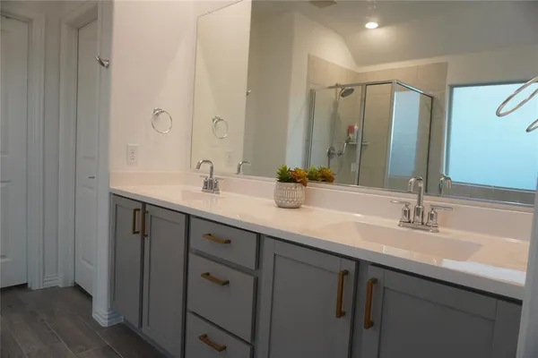 a bathroom with a tub and a shower