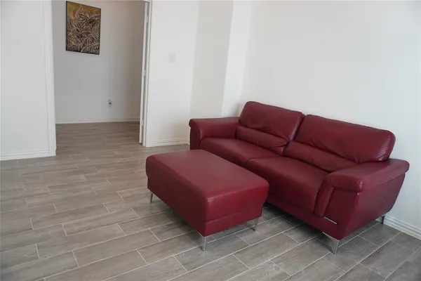 a view of a patio with table and chairs and potted plants
