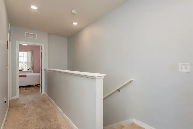 a view of a hallway with closet