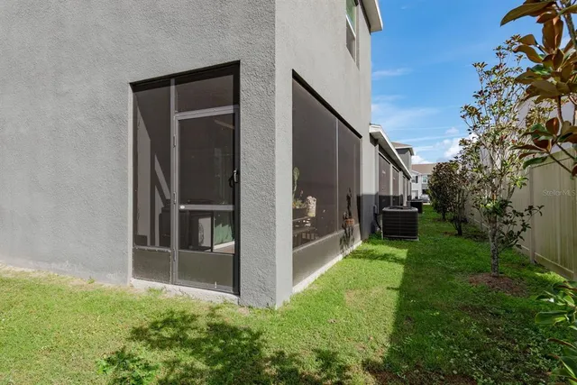 a backyard of a house with seating space