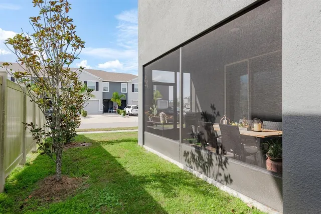 a view of yard with patio