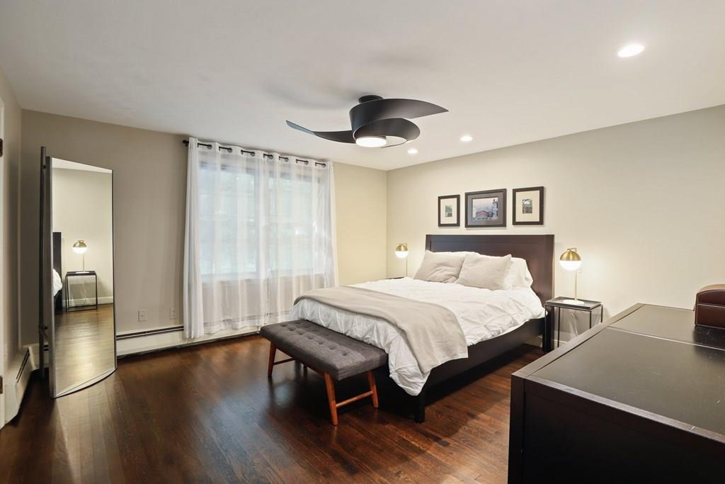 15 Herbert Road Worcester, MA 01602 - Photo 24 of 42 a bed room with a bed and a chandelier