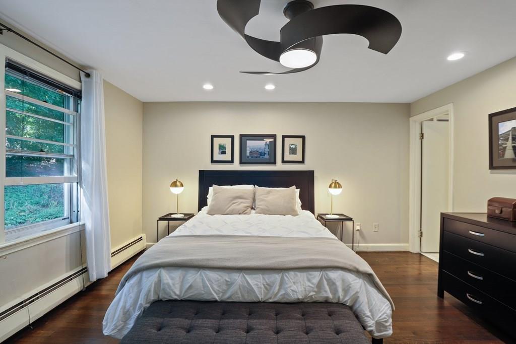 15 Herbert Road Worcester, MA 01602 - Photo 25 of 42 a bedroom with a large bed and a window