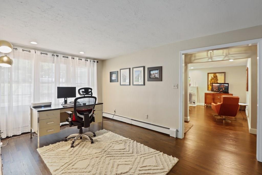 15 Herbert Road Worcester, MA 01602 - Photo 34 of 42 a view of a workspace with wooden floor and furniture