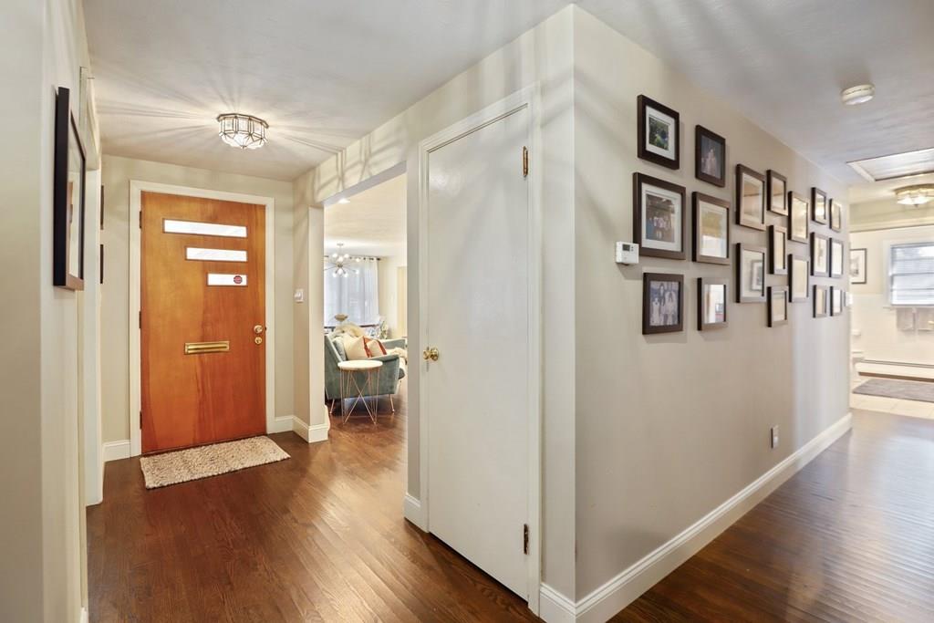 15 Herbert Road Worcester, MA 01602 - Photo 5 of 42 a view of a hallway with wooden floor and closet