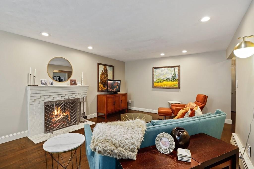 15 Herbert Road Worcester, MA 01602 - Photo 7 of 42 a living room with furniture and a fireplace
