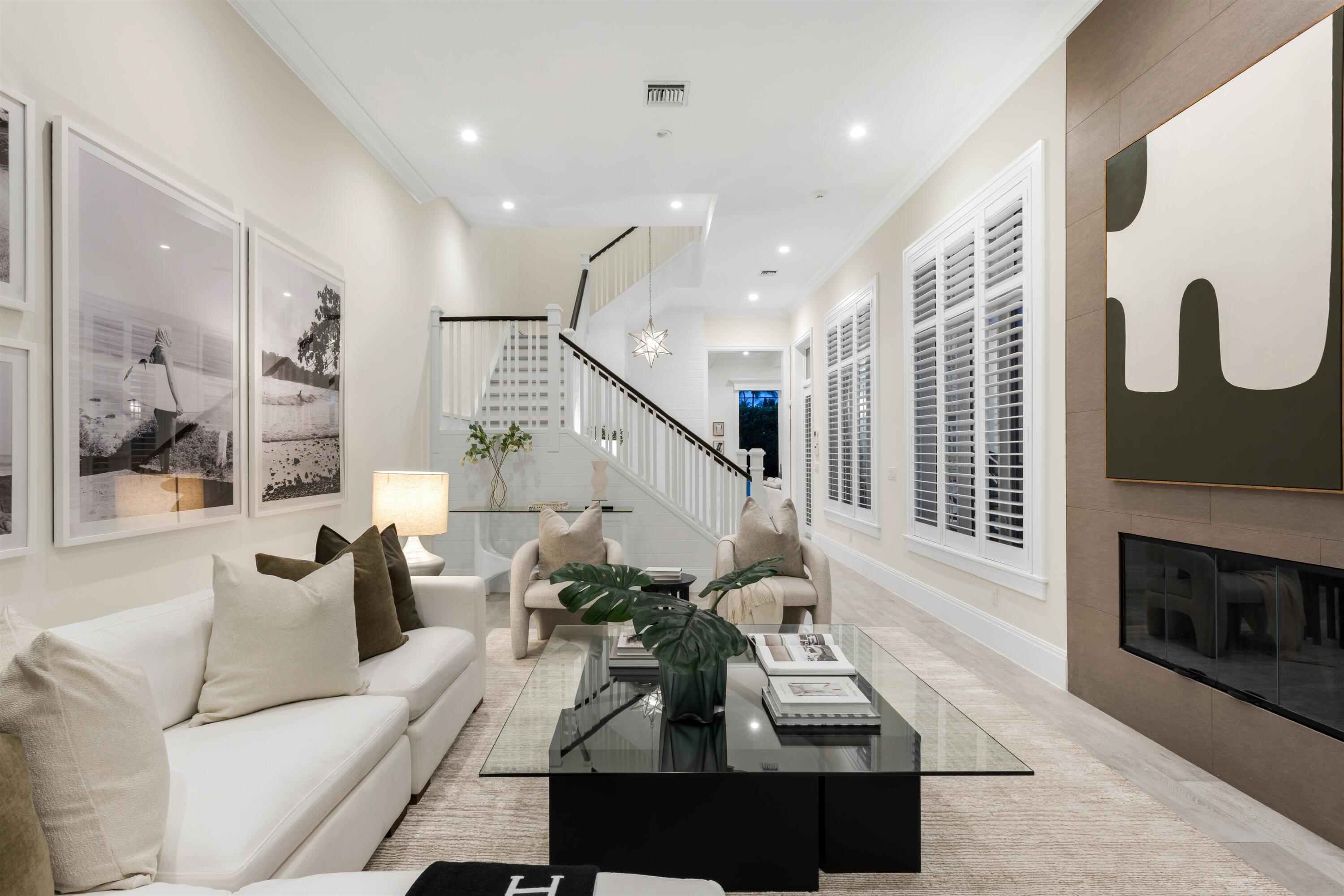 9 Adams Road Ocean Ridge, FL 33435 - Photo 16 of 40 a living room with furniture and a fireplace