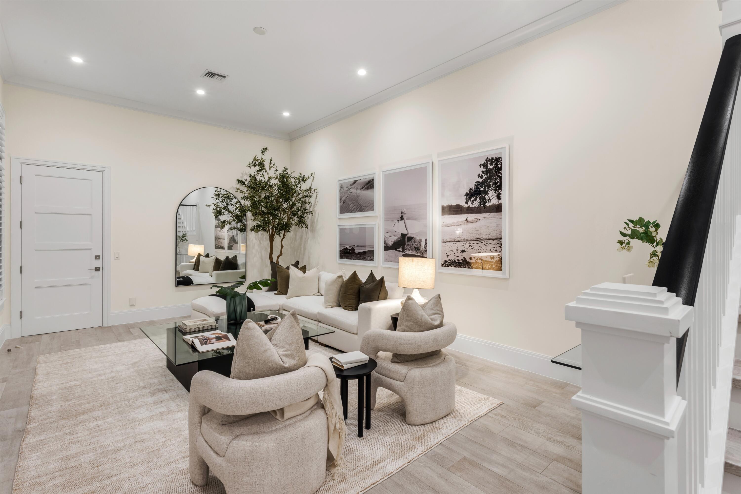 9 Adams Road Ocean Ridge, FL 33435 - Photo 18 of 40 a living room with furniture and a potted plant