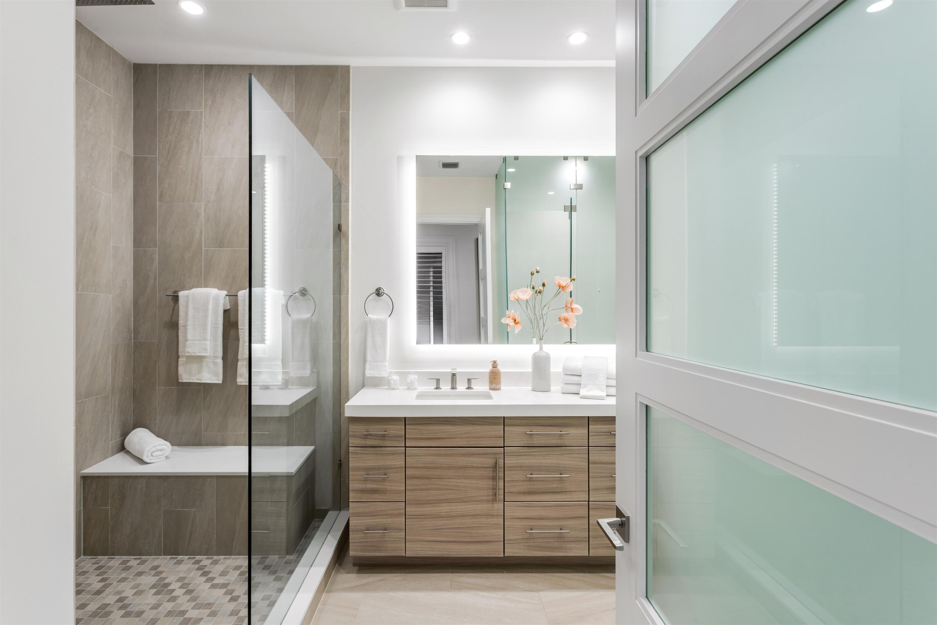 9 Adams Road Ocean Ridge, FL 33435 - Photo 24 of 40 a bathroom with a sink and a mirror