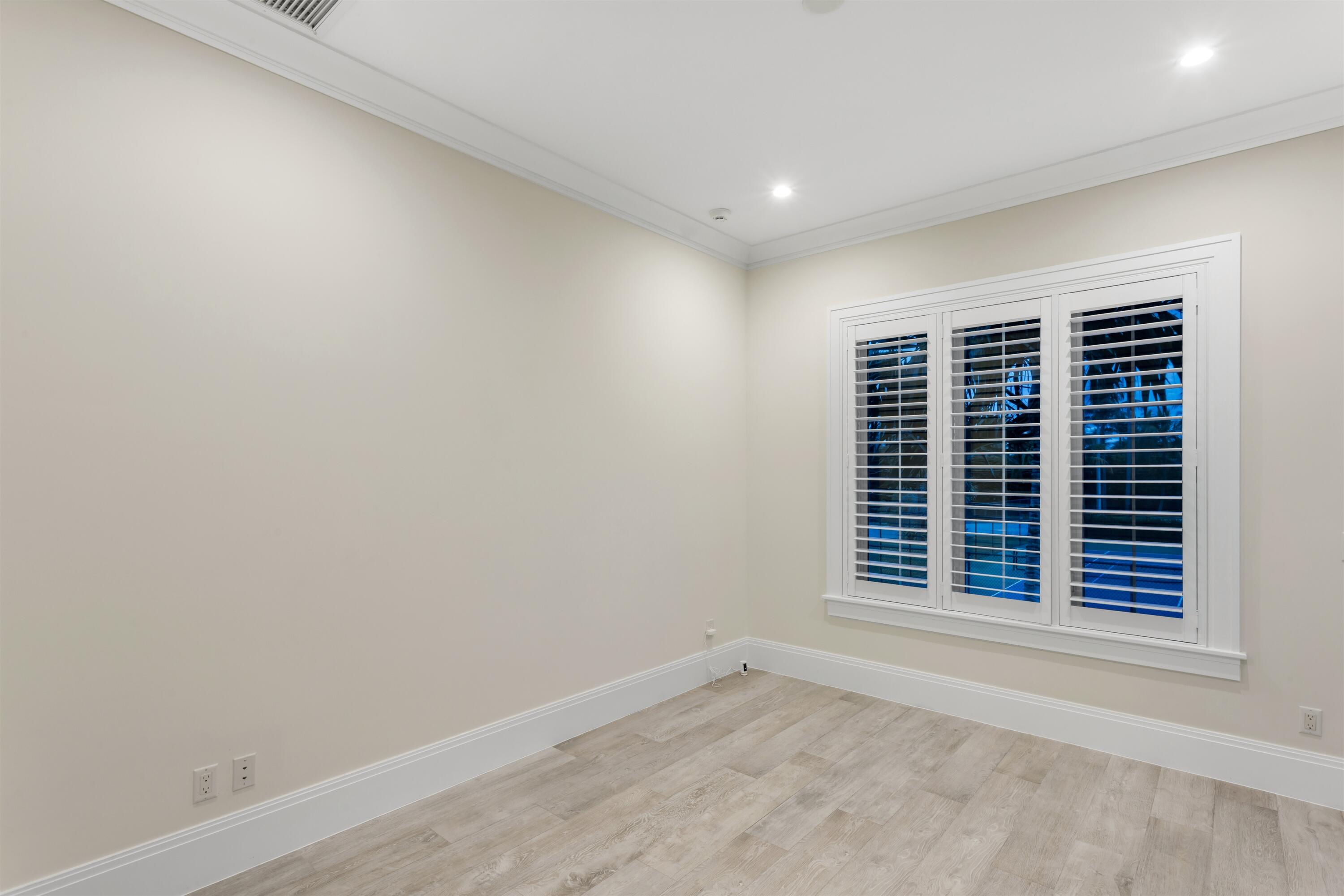 9 Adams Road Ocean Ridge, FL 33435 - Photo 30 of 40 a view of an empty room with a window