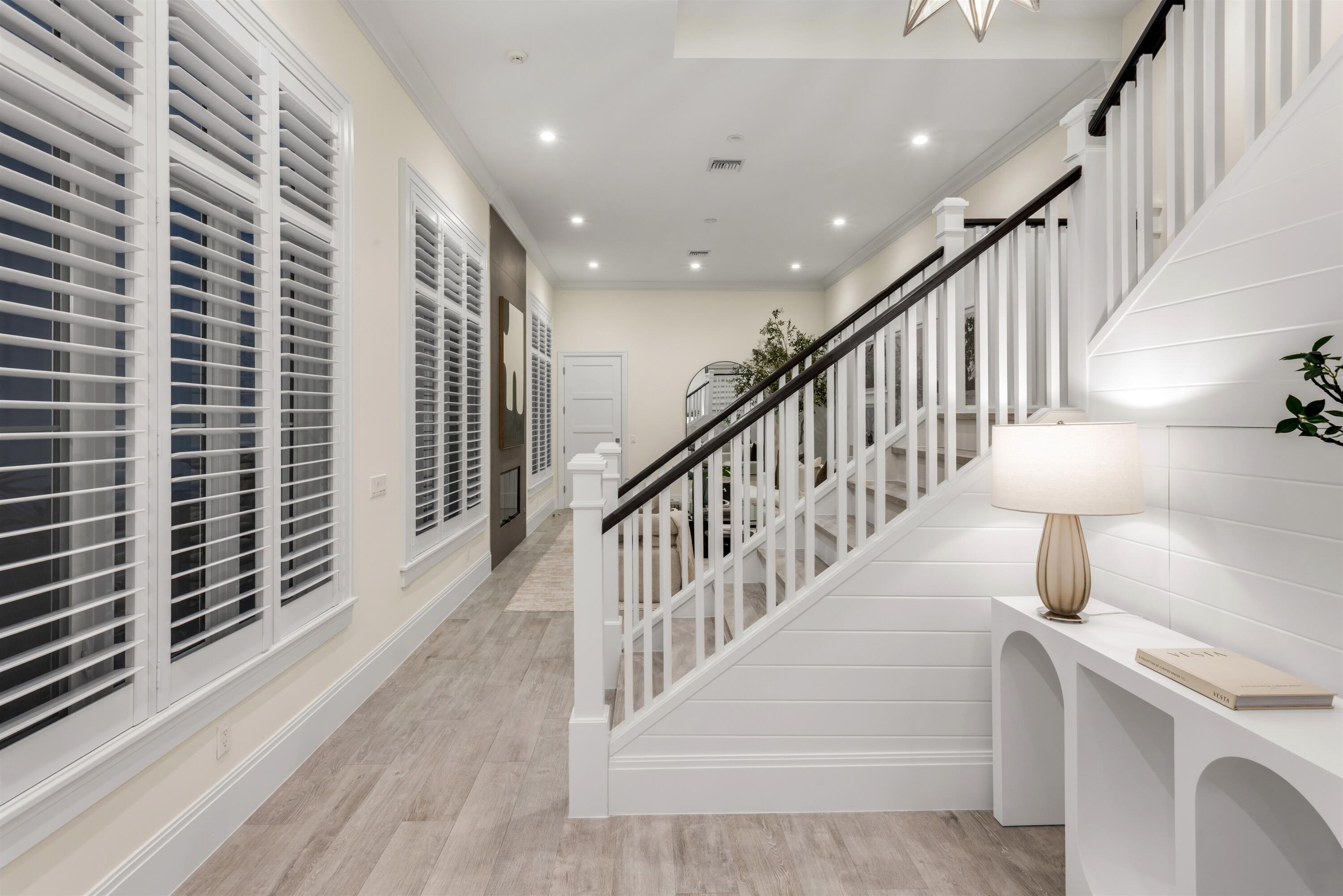 9 Adams Road Ocean Ridge, FL 33435 - Photo 7 of 40 a view of entryway and hall with wooden floor