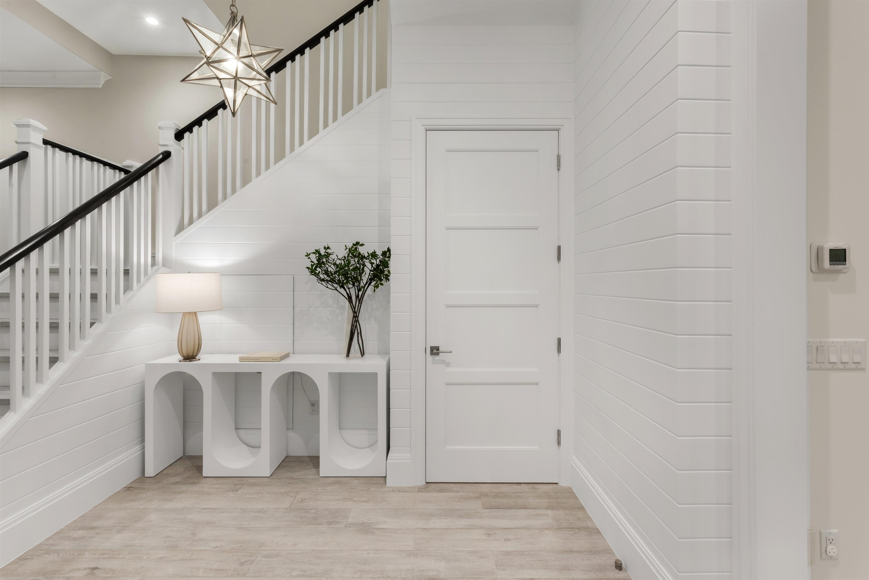 9 Adams Road Ocean Ridge, FL 33435 - Photo 8 of 40 a view of an entryway with wooden floor