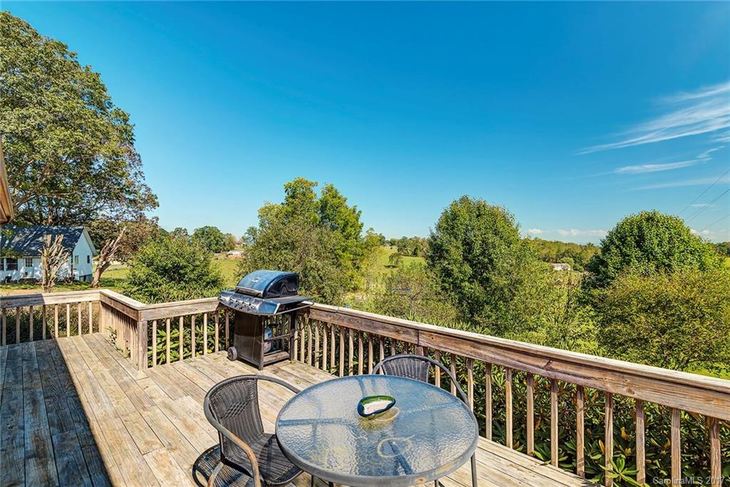 641 Newfound Road Leicester, NC 28748 - Photo 18 of 23 a view of a balcony with furniture
