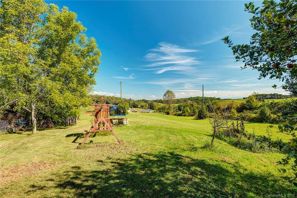 641 Newfound Road Leicester, NC 28748 - Photo 22 of 23 a view of a yard with an outdoor space
