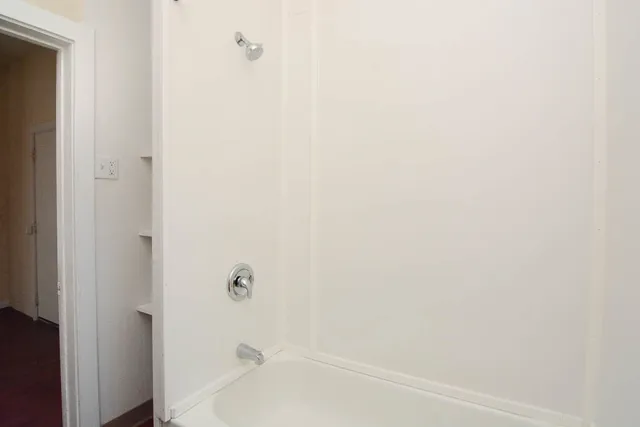 a bathroom with a bathtub