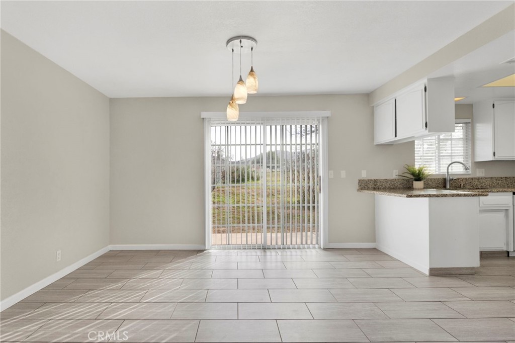 4875 Sunnyslope Road Phelan, CA 92371 - Photo 15 of 57 a view of an empty room with a window