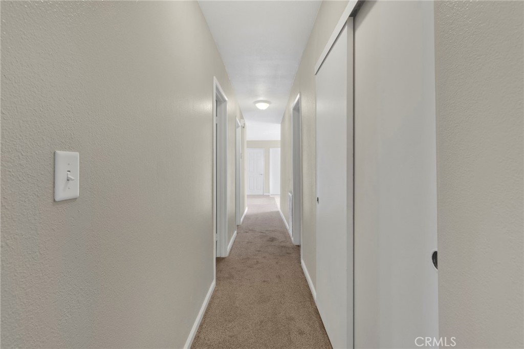4875 Sunnyslope Road Phelan, CA 92371 - Photo 29 of 57 a view of a hallway