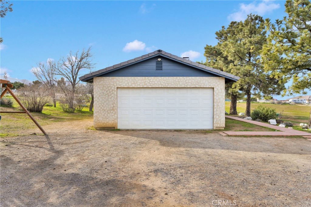4875 Sunnyslope Road Phelan, CA 92371 - Photo 42 of 57 a view of backyard of house