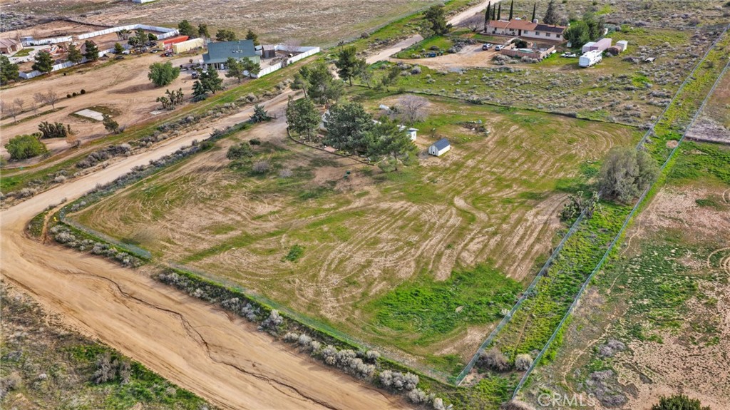 4875 Sunnyslope Road Phelan, CA 92371 - Photo 46 of 57 a view of a yard with an outdoor space