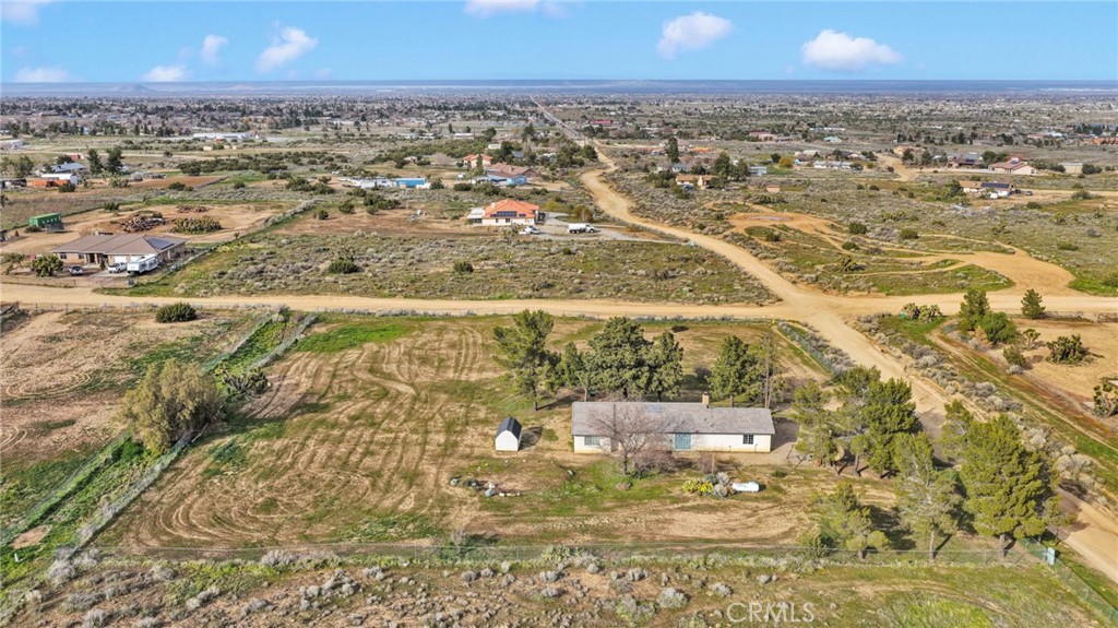 4875 Sunnyslope Road Phelan, CA 92371 - Photo 49 of 57 an aerial view of residential houses with outdoor space