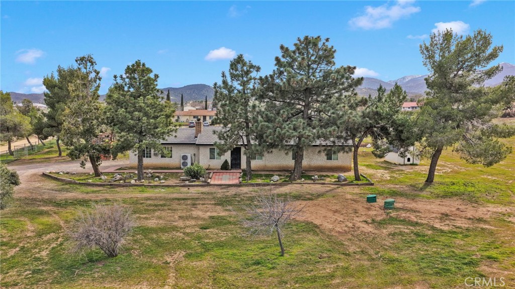 4875 Sunnyslope Road Phelan, CA 92371 - Photo 56 of 57 a view of a yard in front of the house