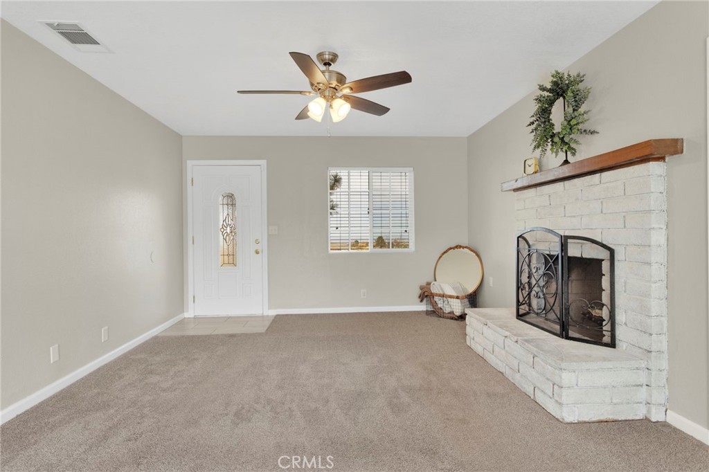 4875 Sunnyslope Road Phelan, CA 92371 - Photo 7 of 57 a living room with furniture
