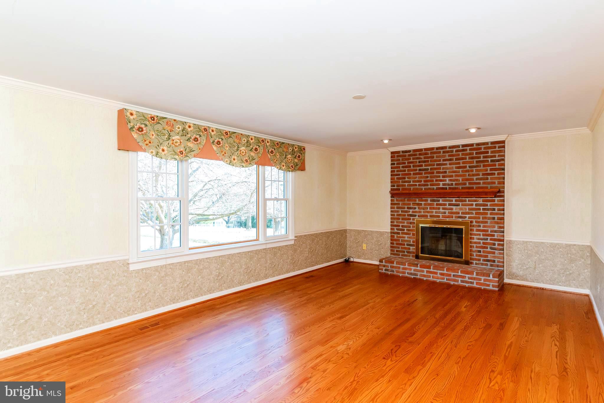 1703 Campbell Road Forest Hill, MD 21050 - Photo 24 of 79 Family room with picture window and fireplace