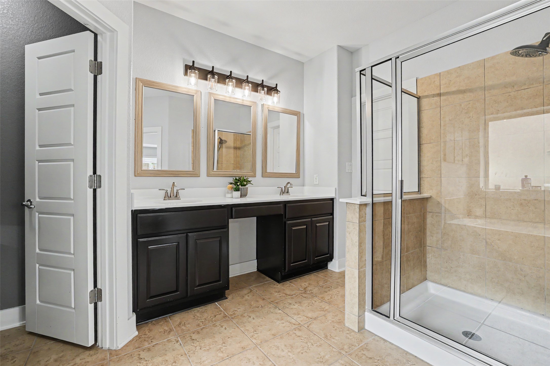 117 Rock Dock Road Georgetown, TX 78633 - Photo 27 of 38 a bathroom with a double vanity sink mirror and shower