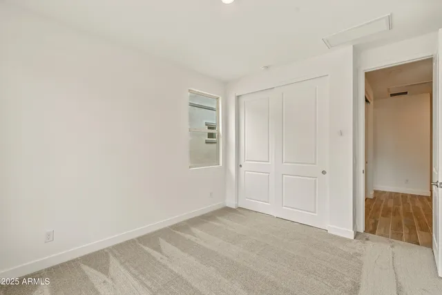 a view of a room that has a window