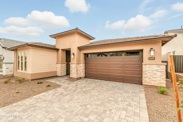 a view of backyard of garage