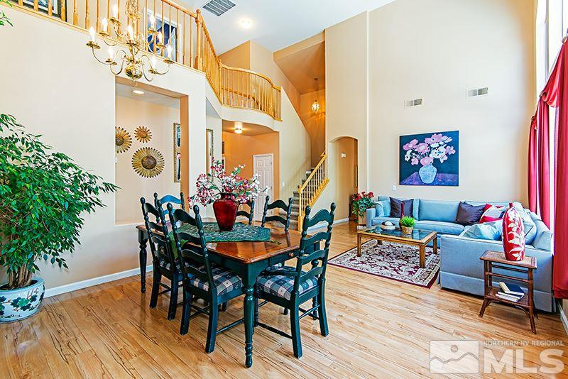9628 Rolling Rock Way Reno, NV 89521 - Photo 12 of 23 a outdoor dining space with furniture and wooden floor