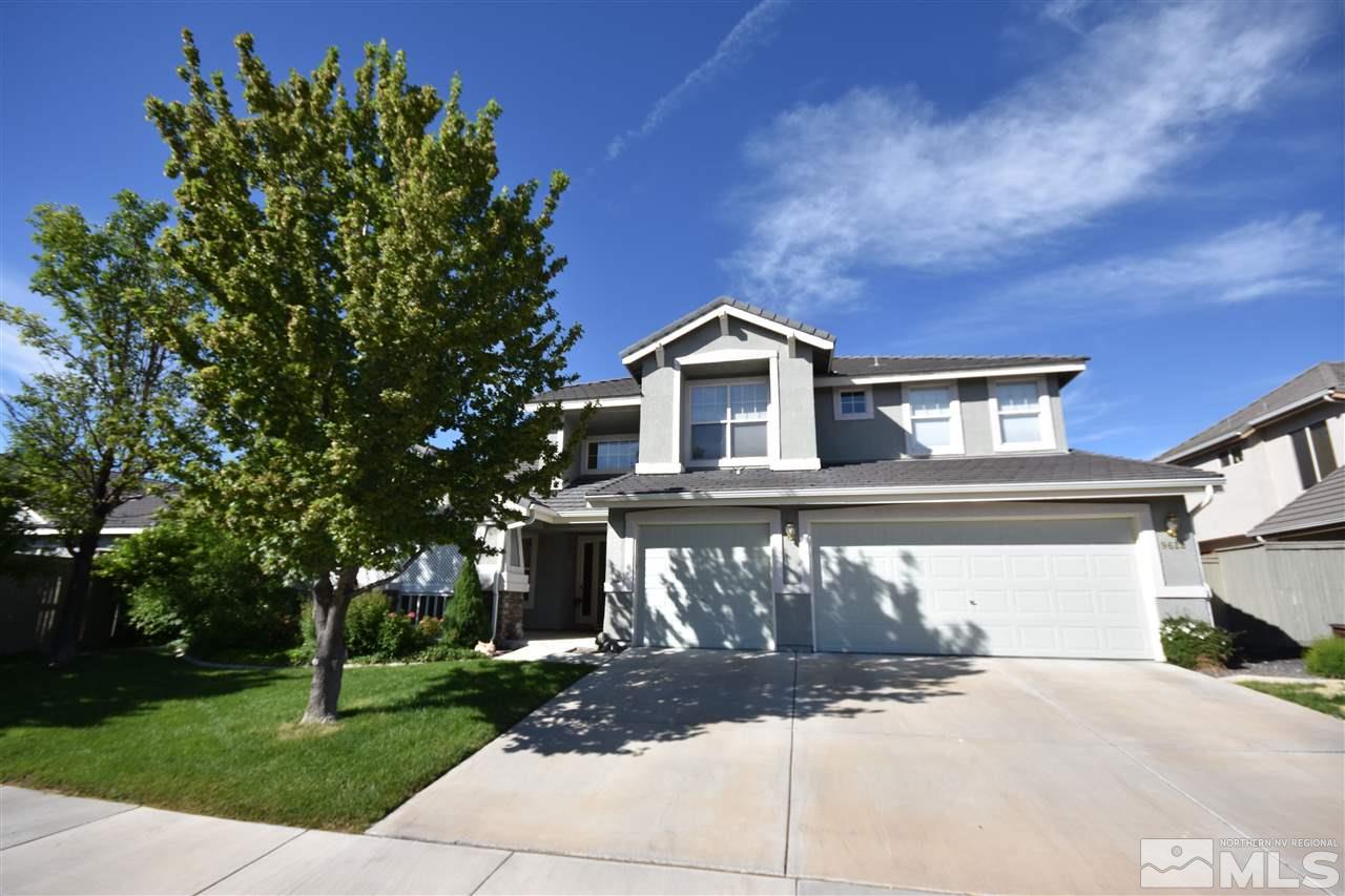 9628 Rolling Rock Way Reno, NV 89521 - Photo 2 of 23 a front view of a house with garden
