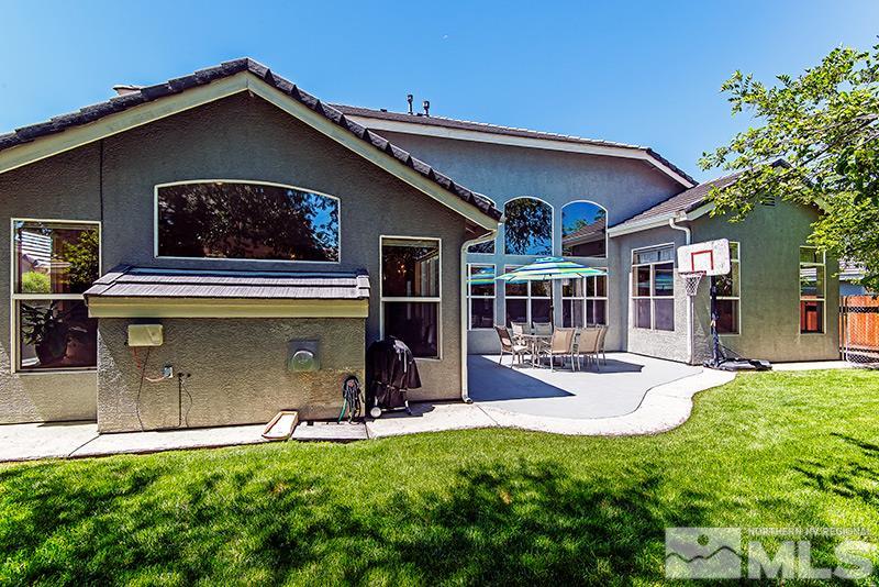 9628 Rolling Rock Way Reno, NV 89521 - Photo 22 of 23 a view of a house with sitting area and garden