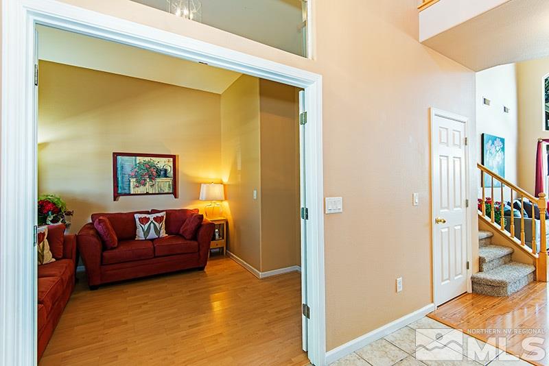 9628 Rolling Rock Way Reno, NV 89521 - Photo 5 of 23 a living room with furniture and a rug