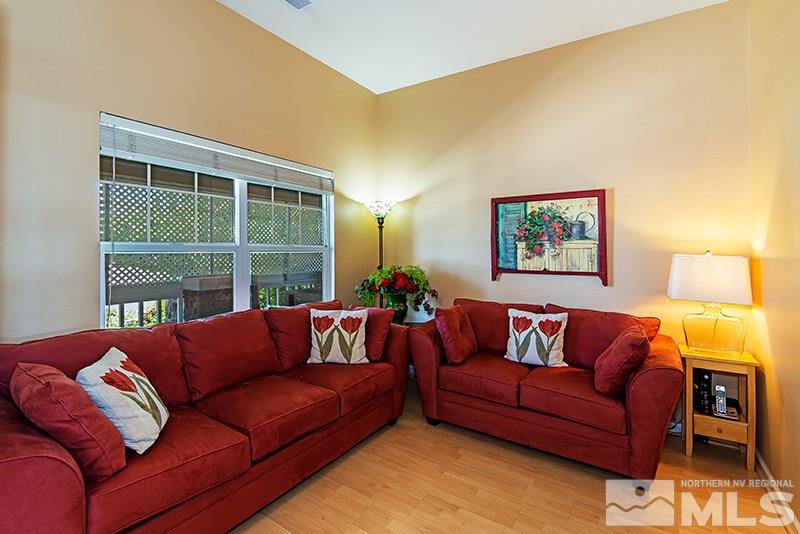 9628 Rolling Rock Way Reno, NV 89521 - Photo 6 of 23 a living room with furniture and a window