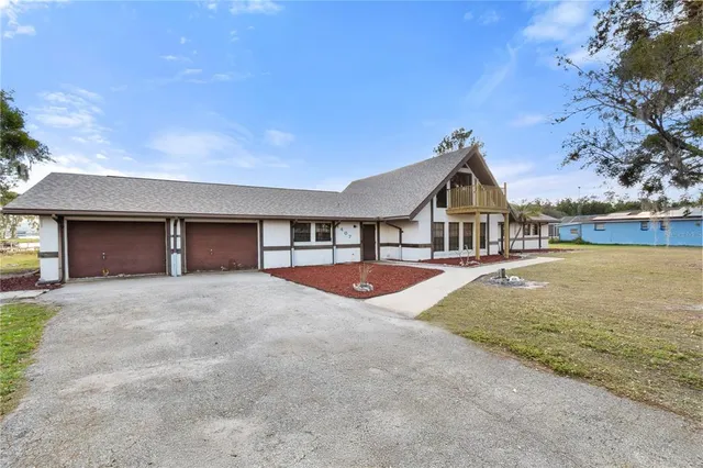 a view of outdoor space yard and front view of a house