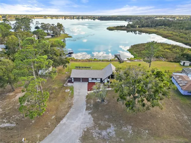 a view of a lake with beach