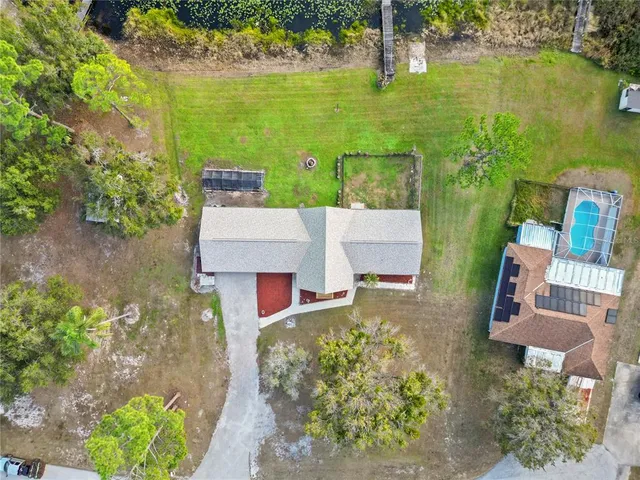 an aerial view of a house with a garden view
