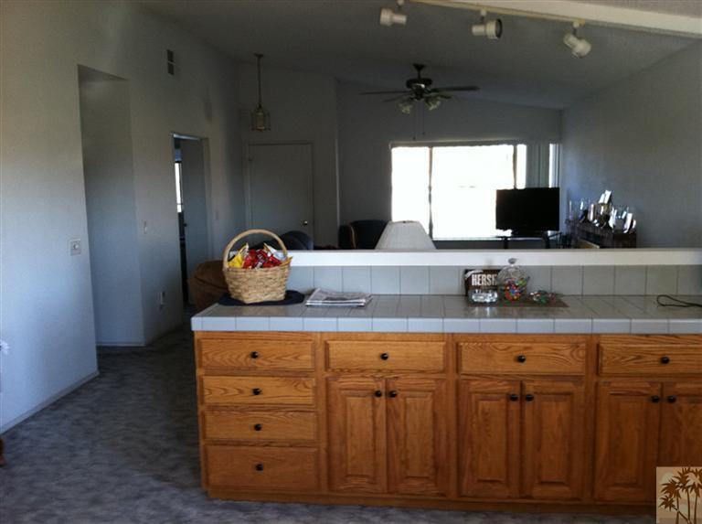 45472 Yale Street Indio, CA 92201 - Photo 4 of 23 a kitchen with cabinets appliances and a window