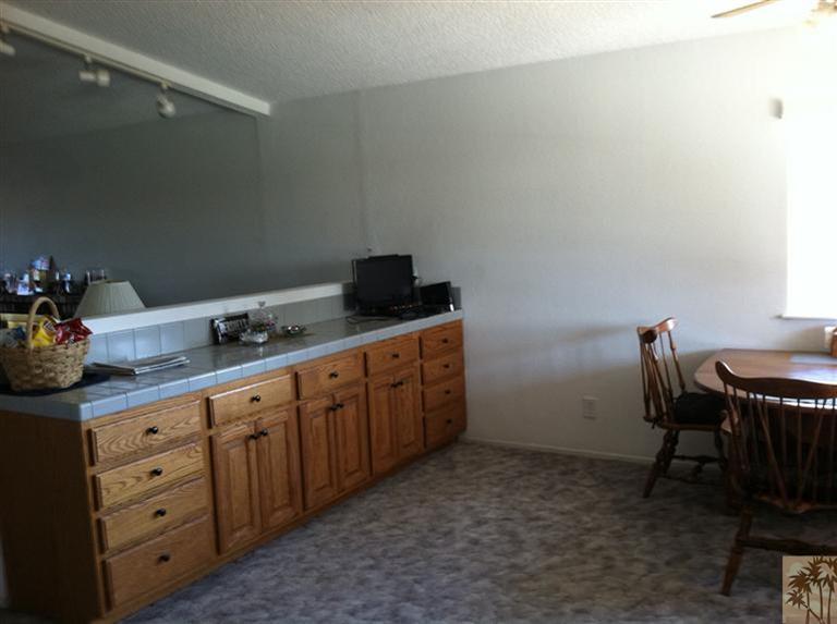 45472 Yale Street Indio, CA 92201 - Photo 5 of 23 a kitchen with appliances cabinets and furniture